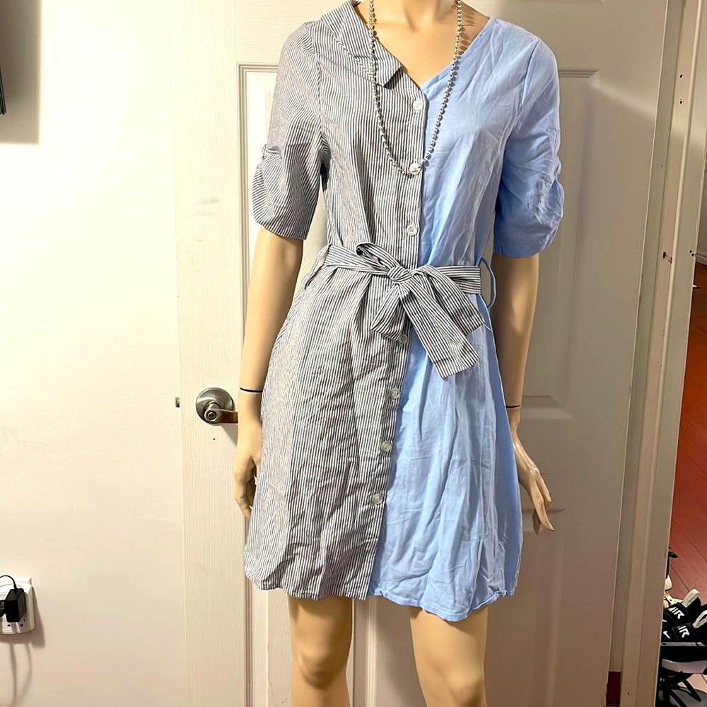 Stylish button down dress.Medium size